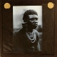 [African man with large ear decoration]