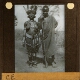 [African man and woman with feathered headdress]