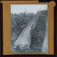 [Woman and child wearing Lapp costume at entrance to tent]