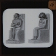 [Statuettes of seated man and woman]