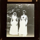 [Two nurses standing in gardens of Alderley Park]