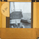 [Decorated stern of sailing ship in unidentified port or harbour]